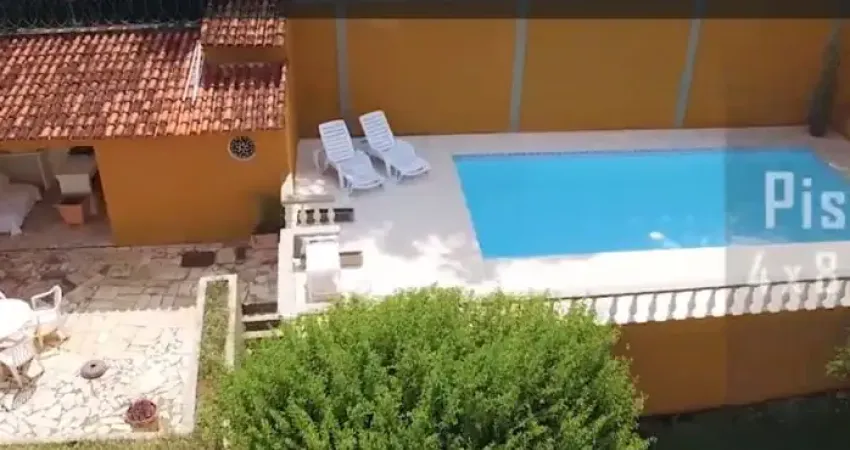 Casa a venda em condomínio fechado com 4 suítes, 487 m² de área construída na Freguesia, Rio de Janeiro - RJ.