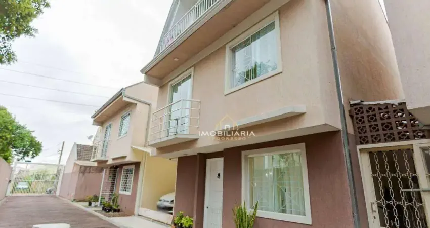 Sobrado com 3 dormitórios à venda, 156 m² por R$ 580.000 - Uberaba - Curitiba/PR
