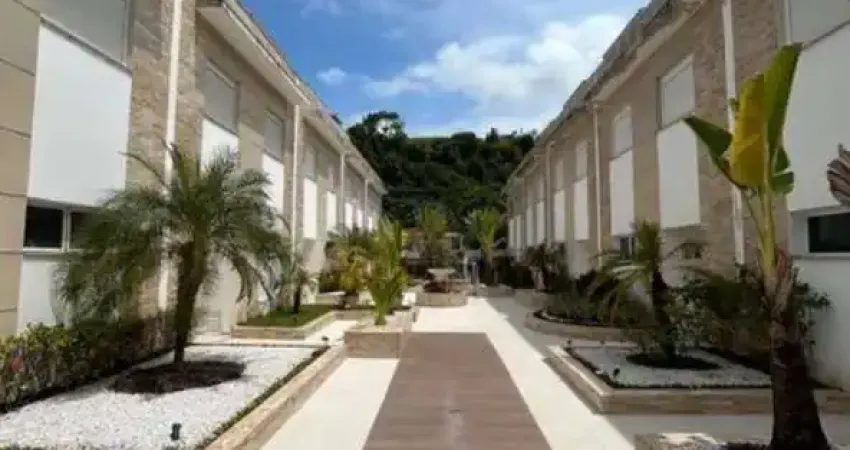 Casa no Guarujá com 4 suítes com armários planejados e 4 vagas de garagem