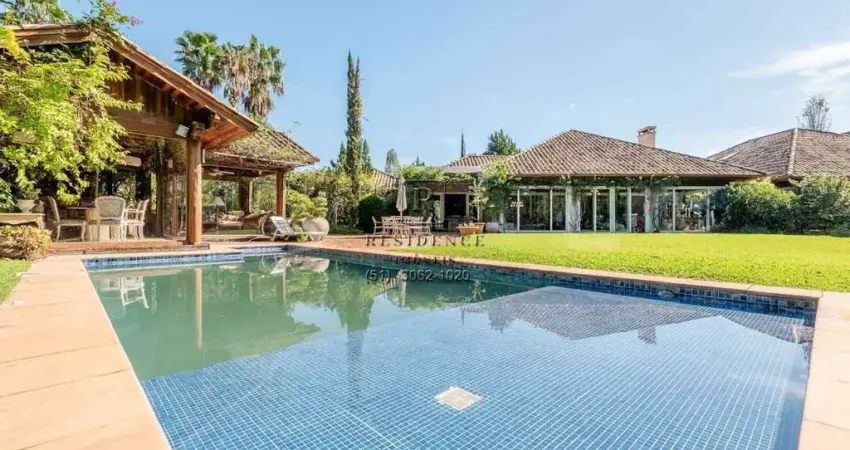 Espetacular Casa Térrea em Condomínio, 4 Suítes e 700m² de Luxo em Belém Novo, Porto Alegre-RS!
