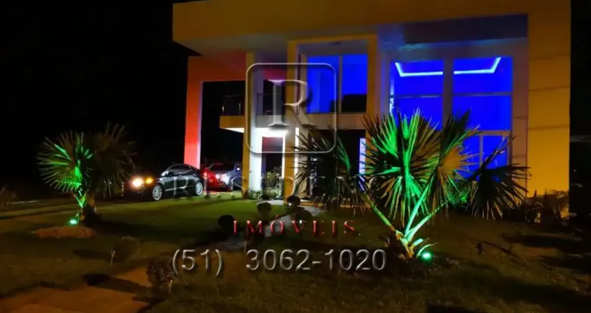 Casa em condomínio de luxo com 3 suítes no centro de imbé-rs: 3 quartos, 3 salas e 500m² de área