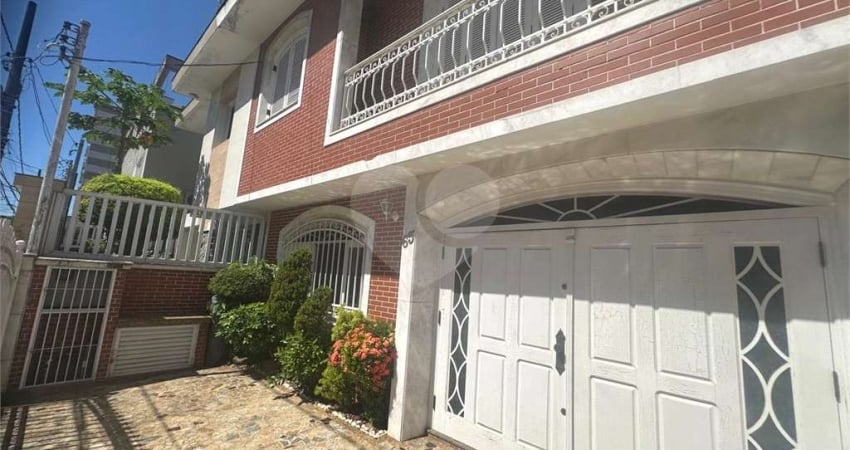 Casa com 3 quartos à venda na Alberto Baccarat, Boqueirão, Santos