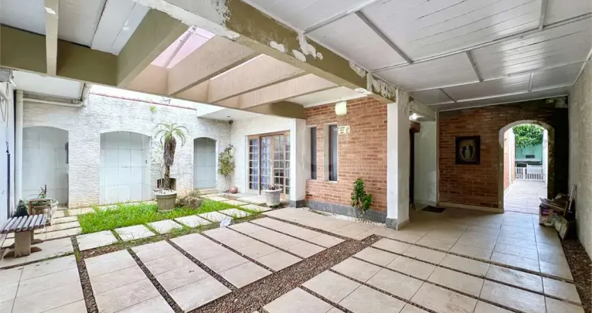 Casa com 3 quartos à venda na Rua Michel Alca, Vila Mirim, Praia Grande