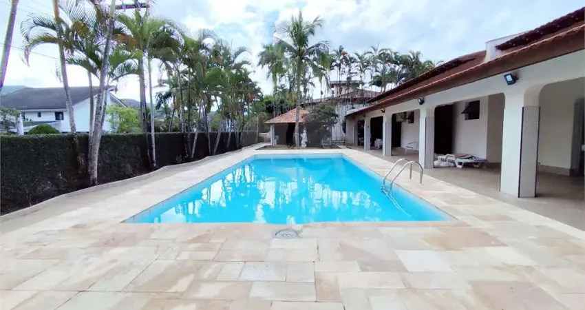 Casa em condomínio fechado com 5 quartos à venda na Primo Prieto, Jardim Acapulco, Guarujá