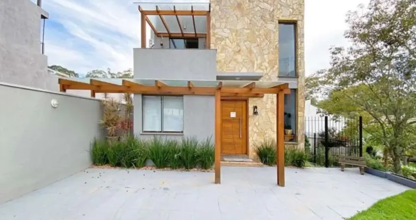 Casa em condomínio fechado com 3 quartos à venda na Avenida Juca Batista, 2705, Hípica, Porto Alegre