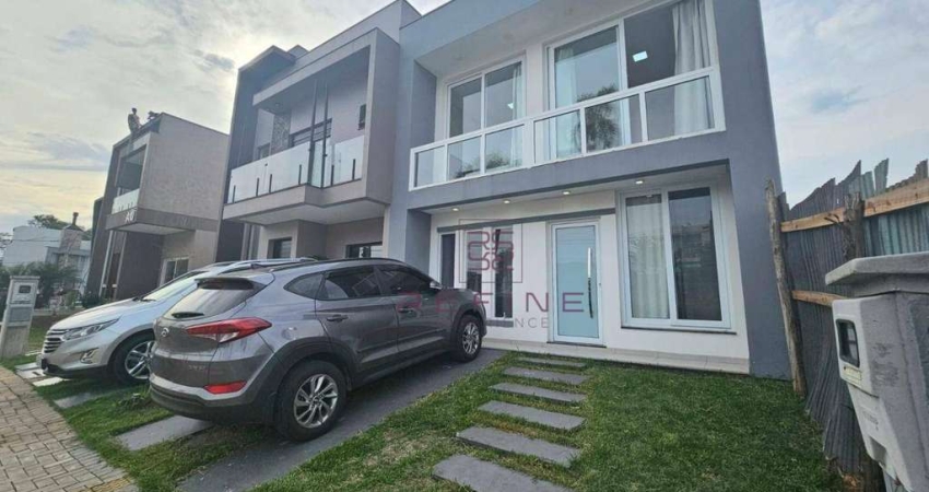 Sobrado com 3 dormitórios à venda, 105 m² por R$ 790.000,00 - Primavera - Gravataí/RS