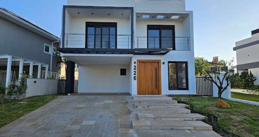 Sobrado com 4 dormitórios à venda, 287 m² por R$ 2.553.000,00 - Alphaville - Gravataí/RS