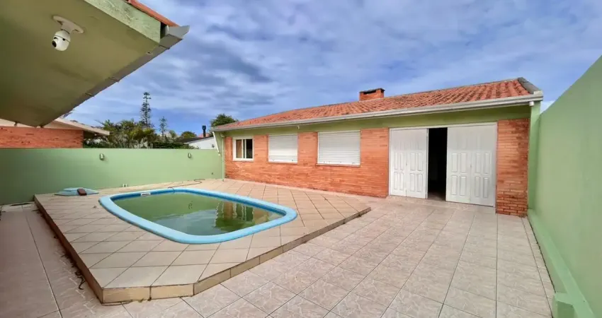 Casa 4 dormitórios com piscina no centro de xangri-la aluguel de temporada