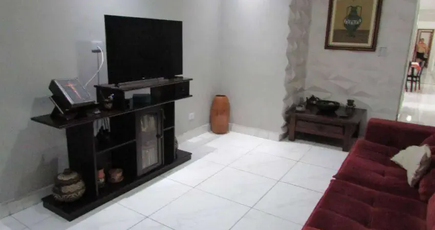 Casa com 3 dormitórios à venda, 119 m² por R$ 500.000,00 - Vila Voturuá - São Vicente/SP