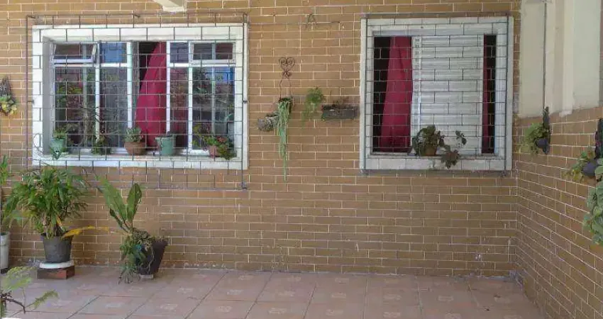 Casa com 3 dormitórios à venda, 144 m² por R$ 450.000,00 - Vila Cascatinha - São Vicente/SP