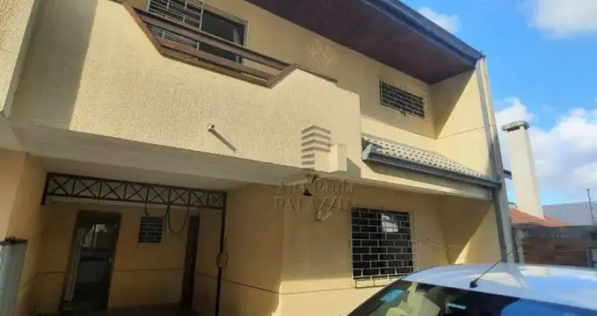 Sobrado com 3 dormitórios à venda, 168 m² por R$ 670.000,00 - Uberaba - Curitiba/PR