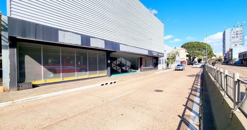 PRÉDIO COMERCIAL TRADICIONAL COM ACESSO DE FRENTE A FUNDOS EM PLENA AVENIDA FARRAPOS