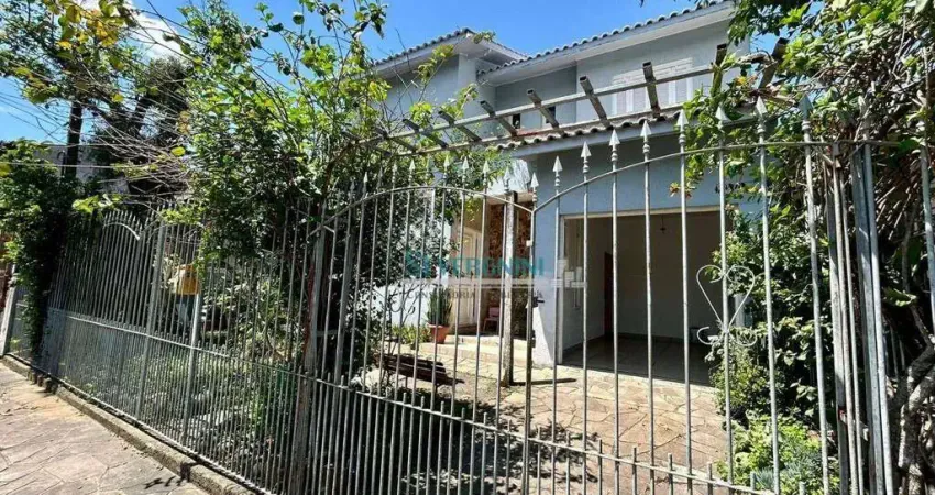 Sobrado com 4 dormitórios à venda, 216 m² por R$ 620.000,00 - Vila Imbui - Cachoeirinha/RS
