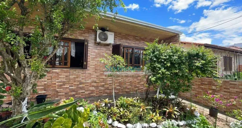 Casa com 4 dormitórios à venda, 241 m² por R$ 599.000,00 - Vila Márcia - Cachoeirinha/RS
