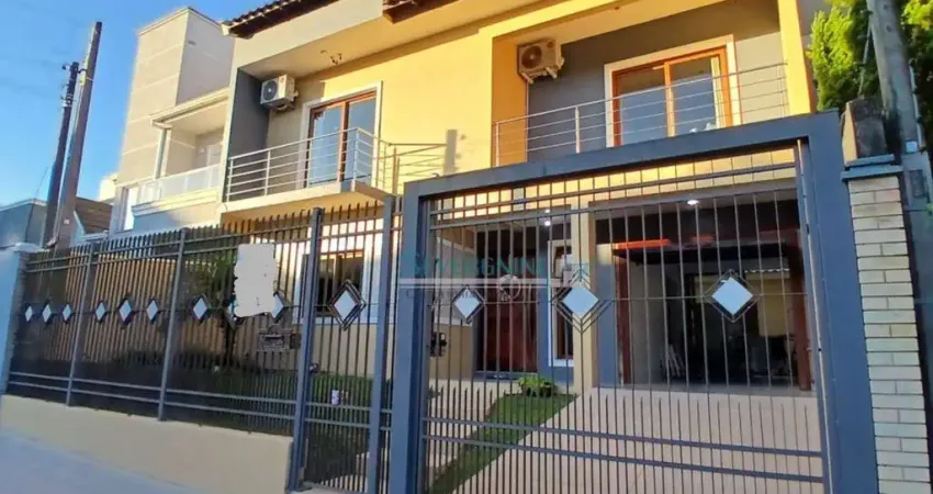 Sobrado com 4 dormitórios à venda, 140 m² por R$ 870.000,00 - Vale do Sol - Cachoeirinha/RS