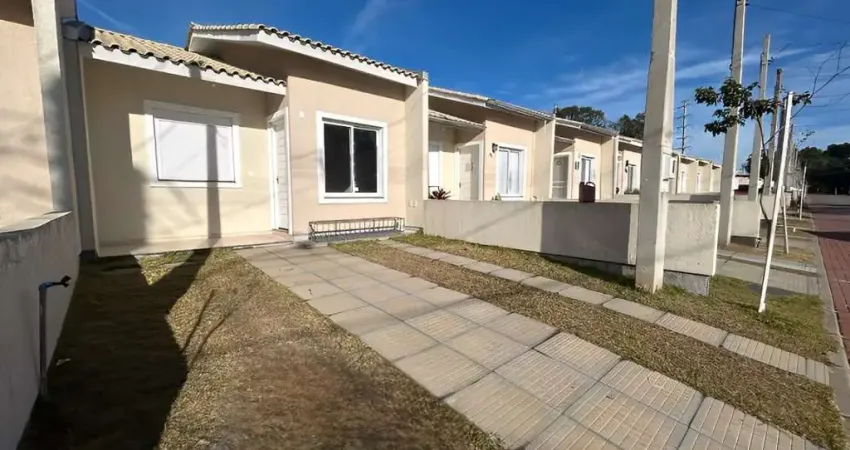 Casa com 2 dormitórios para alugar, 54 m² por R$ 1.898,00/mês - Condomínio Villaggio Blu - Cachoeirinha/RS