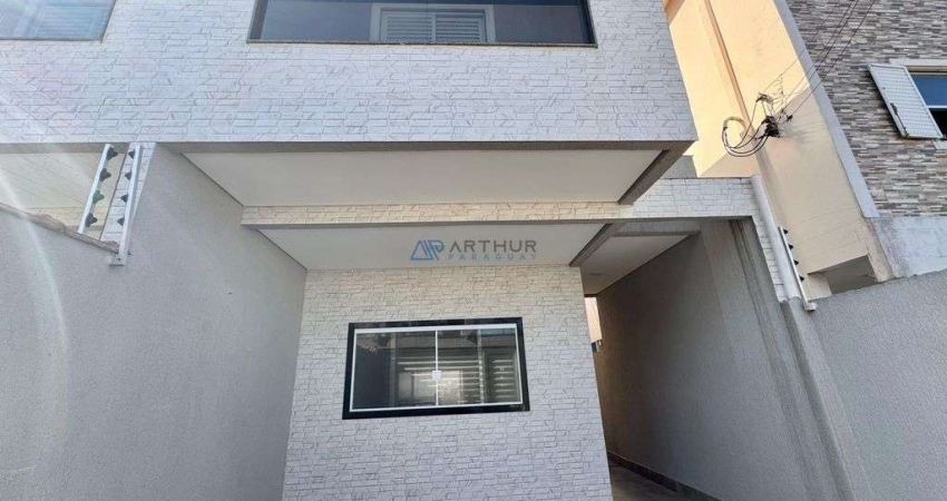 Sobrado à Venda em Praia Grande na Ocian, 3 suítes, 2 vagas e 130m²