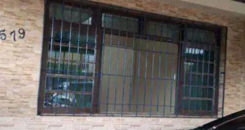 Casa geminada de 2 dormitórios no Caiçara em Praia Grande - SP.