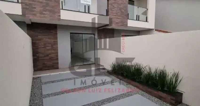 Sobrado Geminado a venda na cidade de Porto Belo/SC, no bairro Jardim Dourado. Com 3 Dormitórios sendo 1 Suíte e 1 Vaga de Garagem. A 1.200 M do Mar