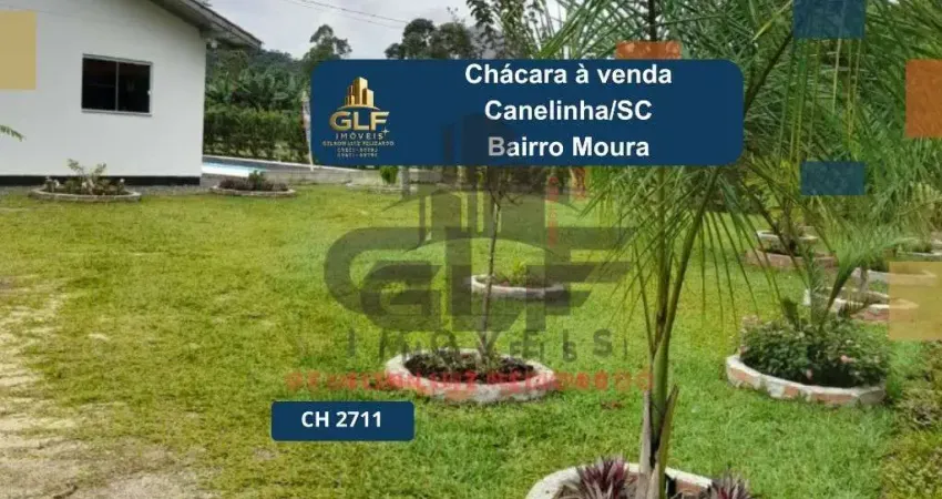 Chácara a venda na cidade de canelinha/sc no bairro moura, com 3.200 m². chácara completa com lavoura, árvores frutíferas, criação de aves e muito mai
