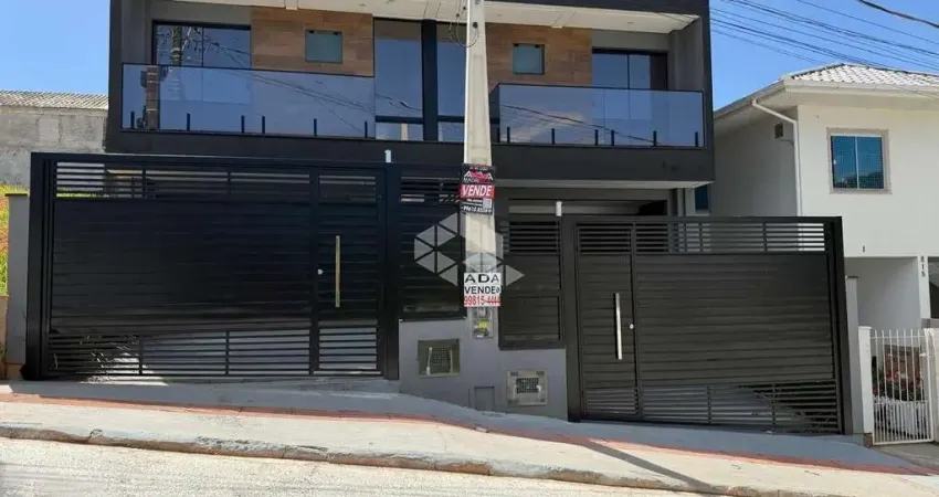 Casa sobrado com 2 dormitórios sendo 1 suíte em palhoça - sc, no bairro bela vista à venda.