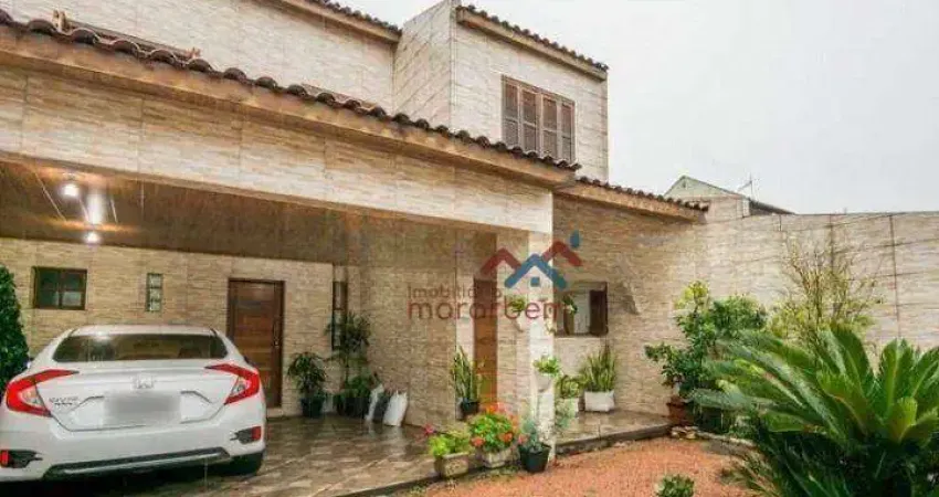 Sobrado com piscina e 4 dormitórios à venda, 164m² por R$ 636.000,00 - Igara - Canoas/RS