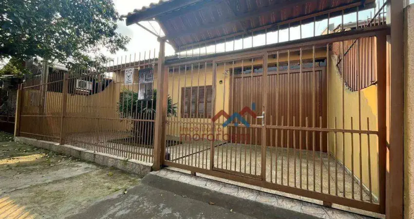 Casa com 2 dormitórios à venda, 103 m² por R$ 318.000,00 - Guajuviras - Canoas/RS