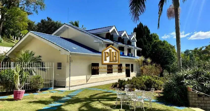 Casa com 5 dormitórios, 656 m² - venda por r$ 5.500.000,00 ou aluguel por r$ 13.224,00/mês - condomínio flamboyant - atibaia/sp
