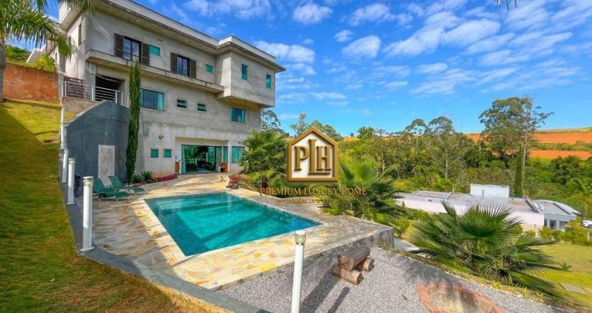 Casa com 7 dormitórios, 630 m² - venda por R$ 3.000.000 ou aluguel por R$ 18.850/mês - Condomínio Portal Ouro Verde - Atibaia/SP