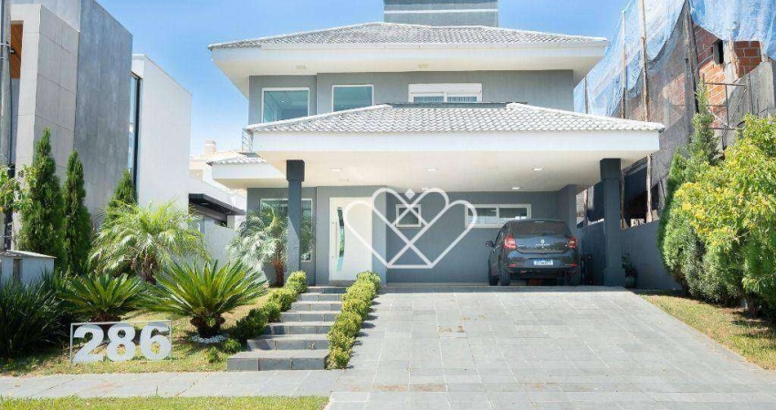 Casa alto padrão com 4 quartos à venda e locação no condomínio Alphaville em Gravataí