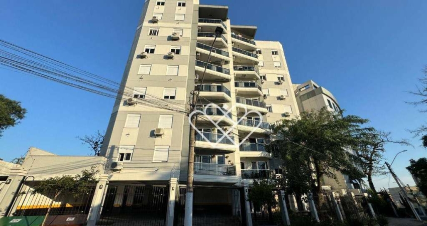Apartamento sofisticado no Centro com sacada, móveis planejados e infraestrutura moderna
