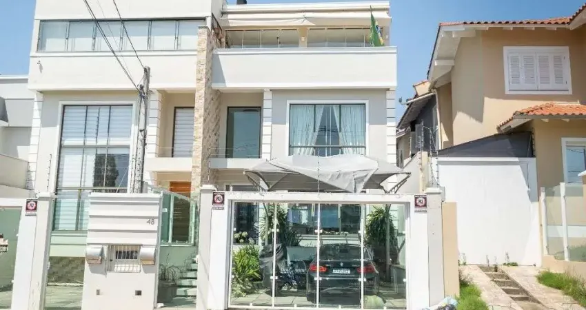 Encante-se com Esta Casa de Alto Padrão no Bairro Reserva Dom Feliciano!