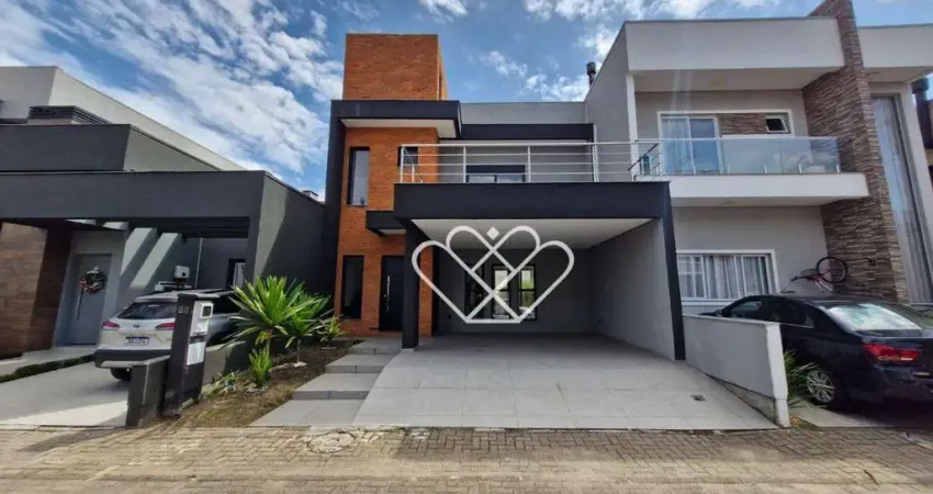 Casa moderna com suíte, sacada e 2 vagas no condomínio Vale dos Lírios em Gravataí