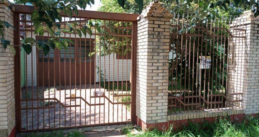 Alugue esta casa espaçosa e bem localizada com 3 quartos e quintal em Gravataí