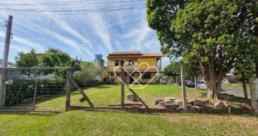 Casa de esquina com pátio amplo à venda no bairro Santa Fé, em Gravataí