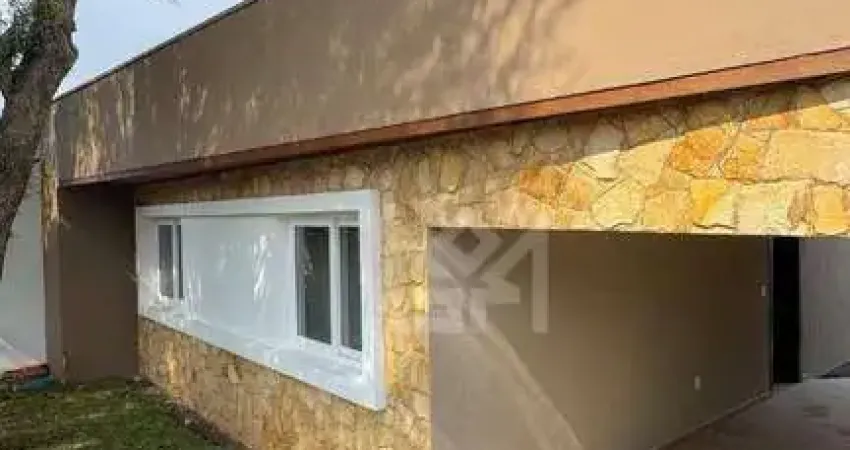 Casa térrea com 3 dormitórios e amplo pátio em bairro tranquilo de gravataí