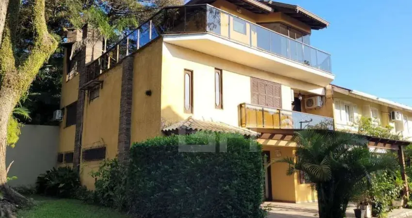 Casa em condomínio fechado com 4 quartos à venda na Avenida Juca Batista, Ipanema, Porto Alegre