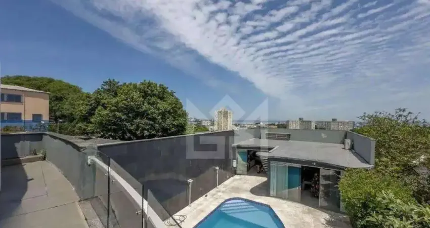 Casa com 3 quartos à venda na Rua Delfino Riet, Santo Antônio, Porto Alegre