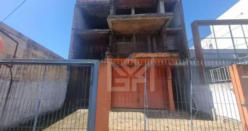 Prédio com 3 andares e amplo estacionamento no bairro higienópolis