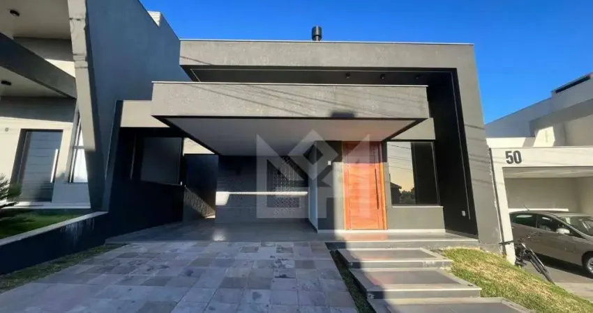 Casa de alto padrão no condomínio gênova no bairro villa lucchesi em gravataí