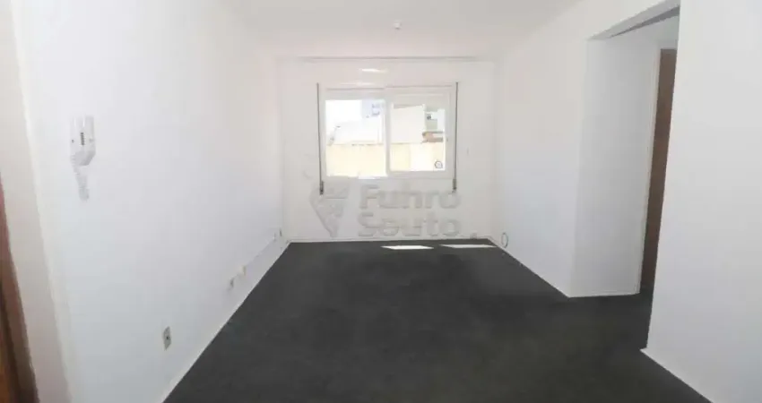 Aluga-se Apartamento de 2 Dormitórios no Edifício Residencial Comodoro - Conforto e Praticidade no Centro de Pelotas