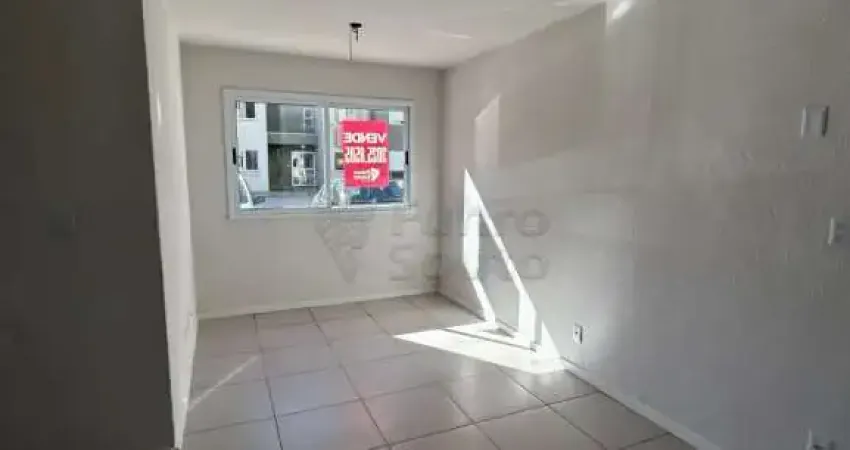 Apartamento térreo no condomínio coimbra de 2 dormitórios.