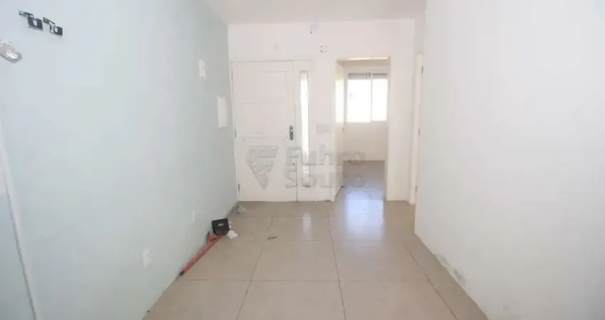 Oportunidade no Coração de Pelotas - Casa Comercial com Estrutura Versátil e Localização Estratégica