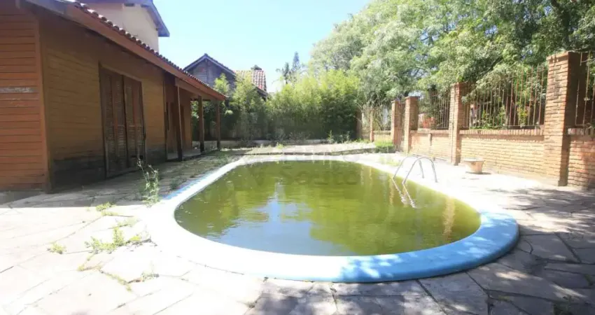 Casa com 3 quartos para alugar na Rua General José Artigas, 118935462, Laranjal, Pelotas