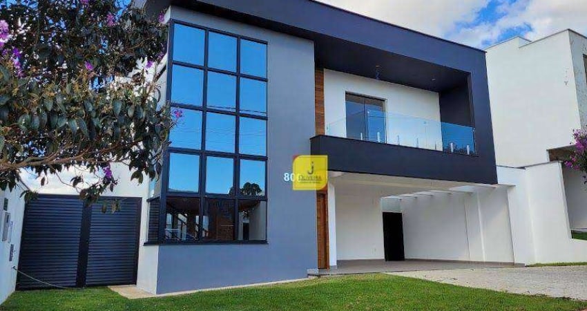Casa com 4 quartos (3 suítes), espaço gourmet, quintal e 4 vagas no Condomínio Residencial Alvim