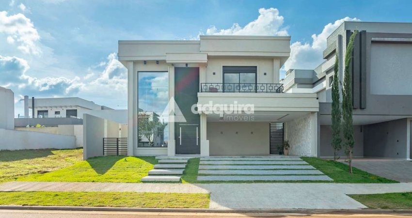 Casa à venda no condomínio Alphaville, contendo 3 suítes.