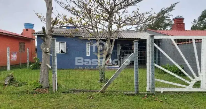 Casa com anexo aos fundo em Nova Tramandaí