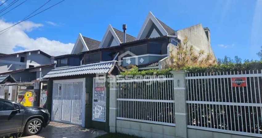 SOBRADO  NO CENTRO DE TRAMANDAÍ COM 3 QUARTOS