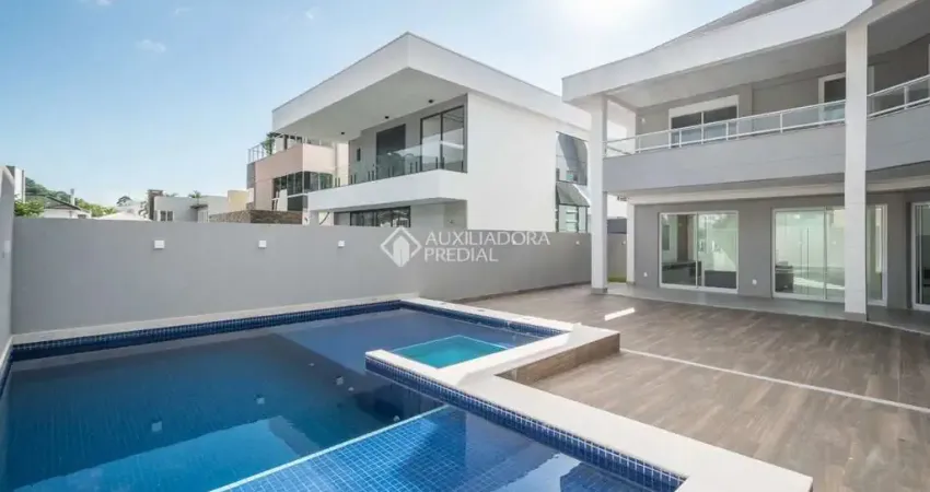 Casa em condomínio fechado com 5 quartos à venda na Avenida das Arapongas, 1265, Ariribá, Balneário Camboriú