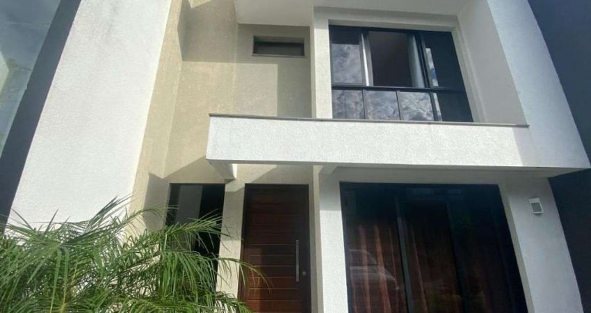 Sobrado com 3 dormitórios para alugar, 112 m² por R$ 6.735,00/mês - Primavera - Gravataí/RS